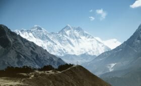 View of Mount Everest from Everest Hotel Namche Bazaar, in the Sagarmatha National Park, Nepal. Sunshine and shadows on the snowy mountains